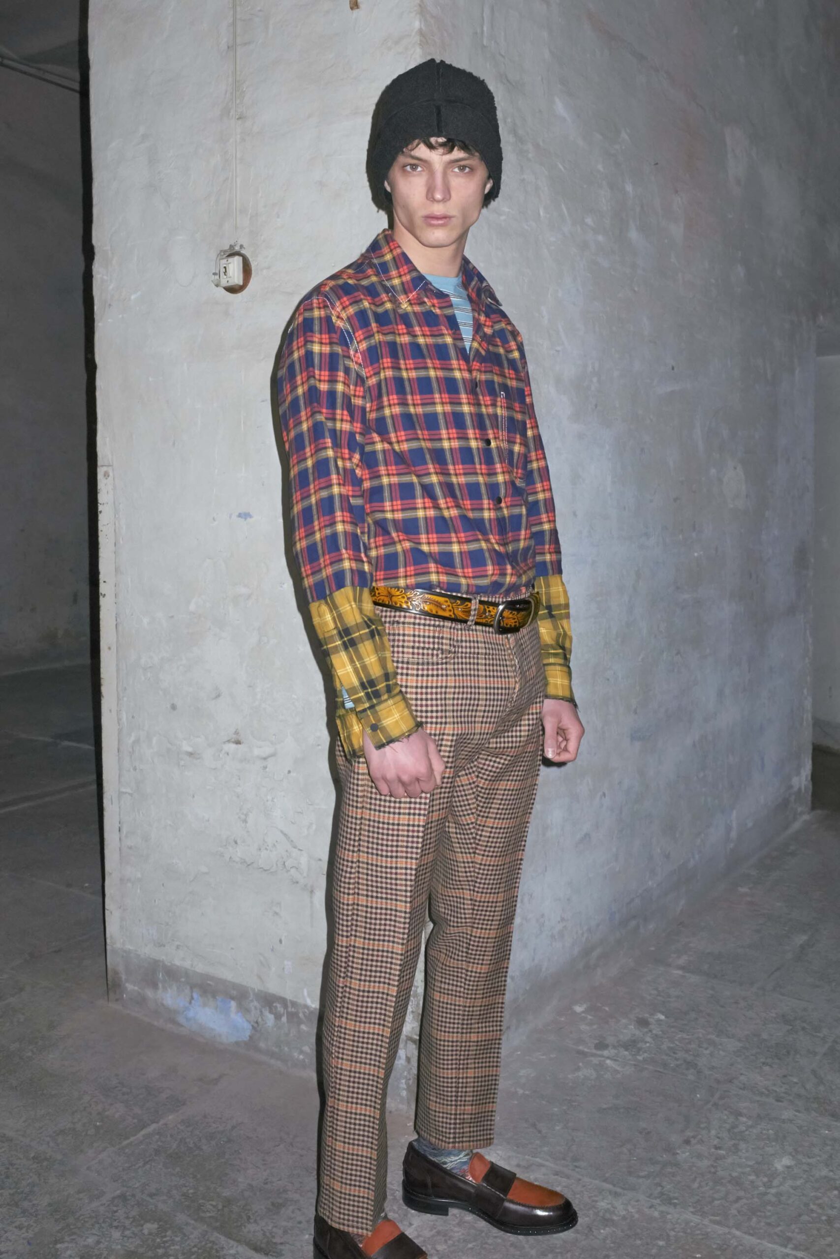 relaxed checkered shirt and tailored pants