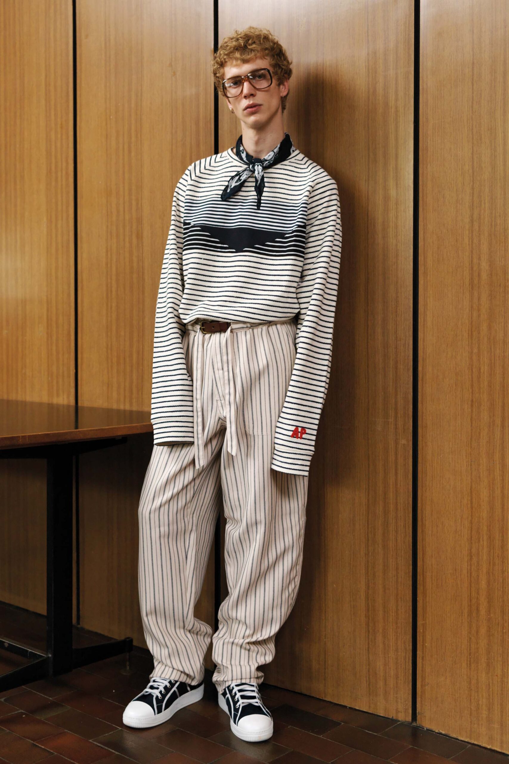 relaxed striped top and pleated pants