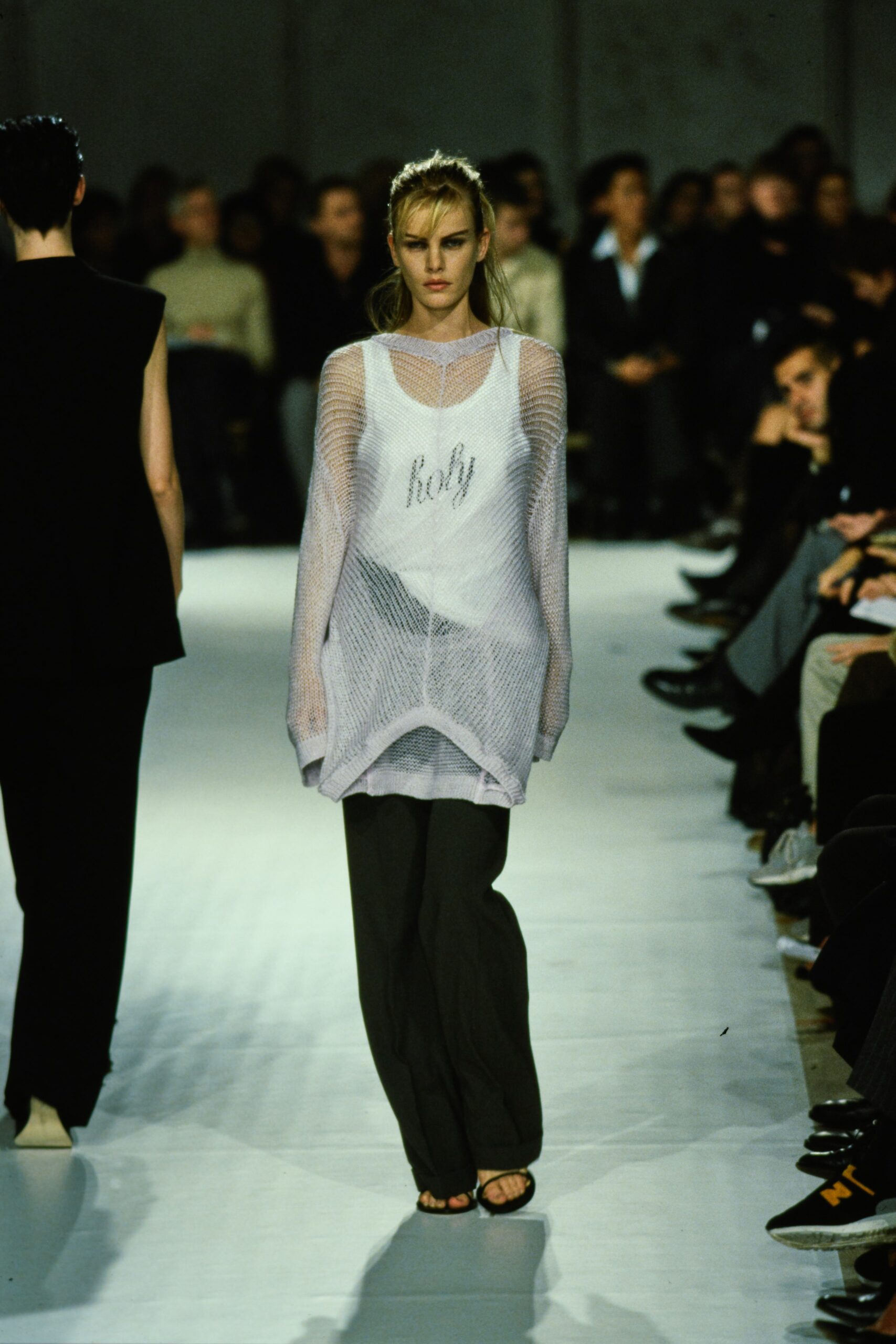 sheer white mesh top with black pants