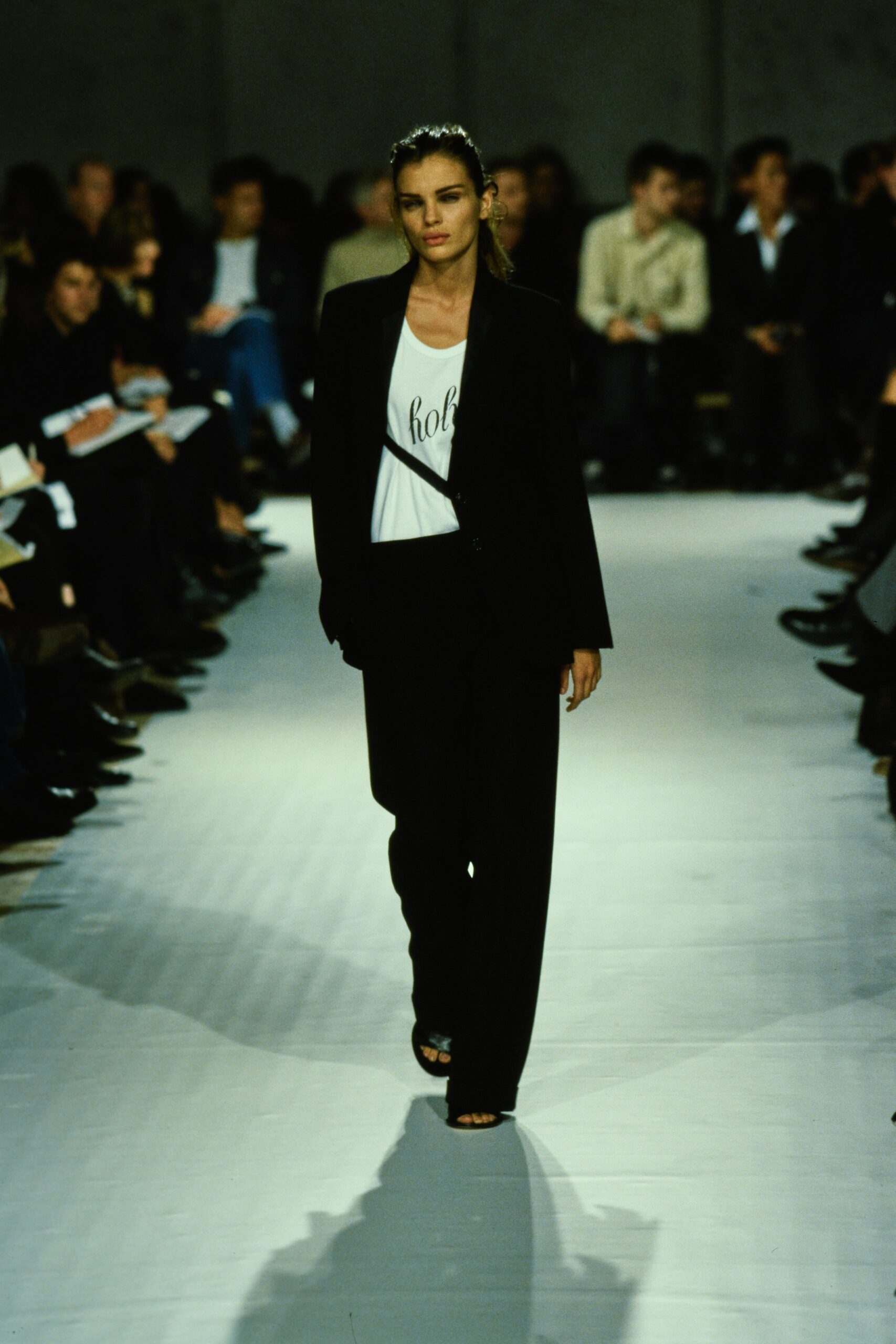 black tailored suit with white top