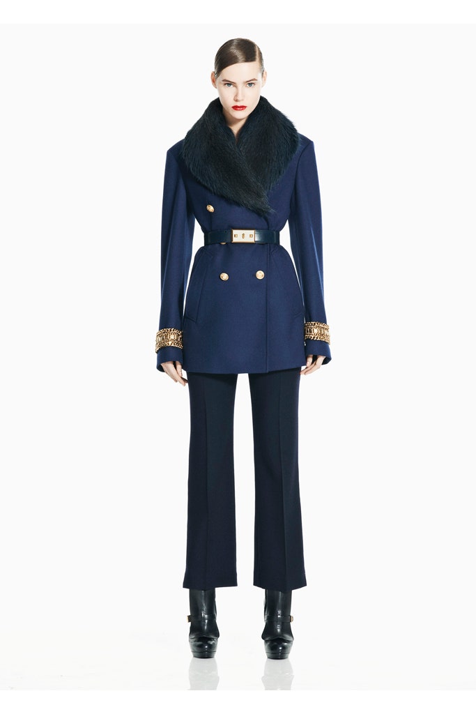 blue tailored jacket with black pants