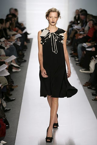 black fitted sleeveless dress