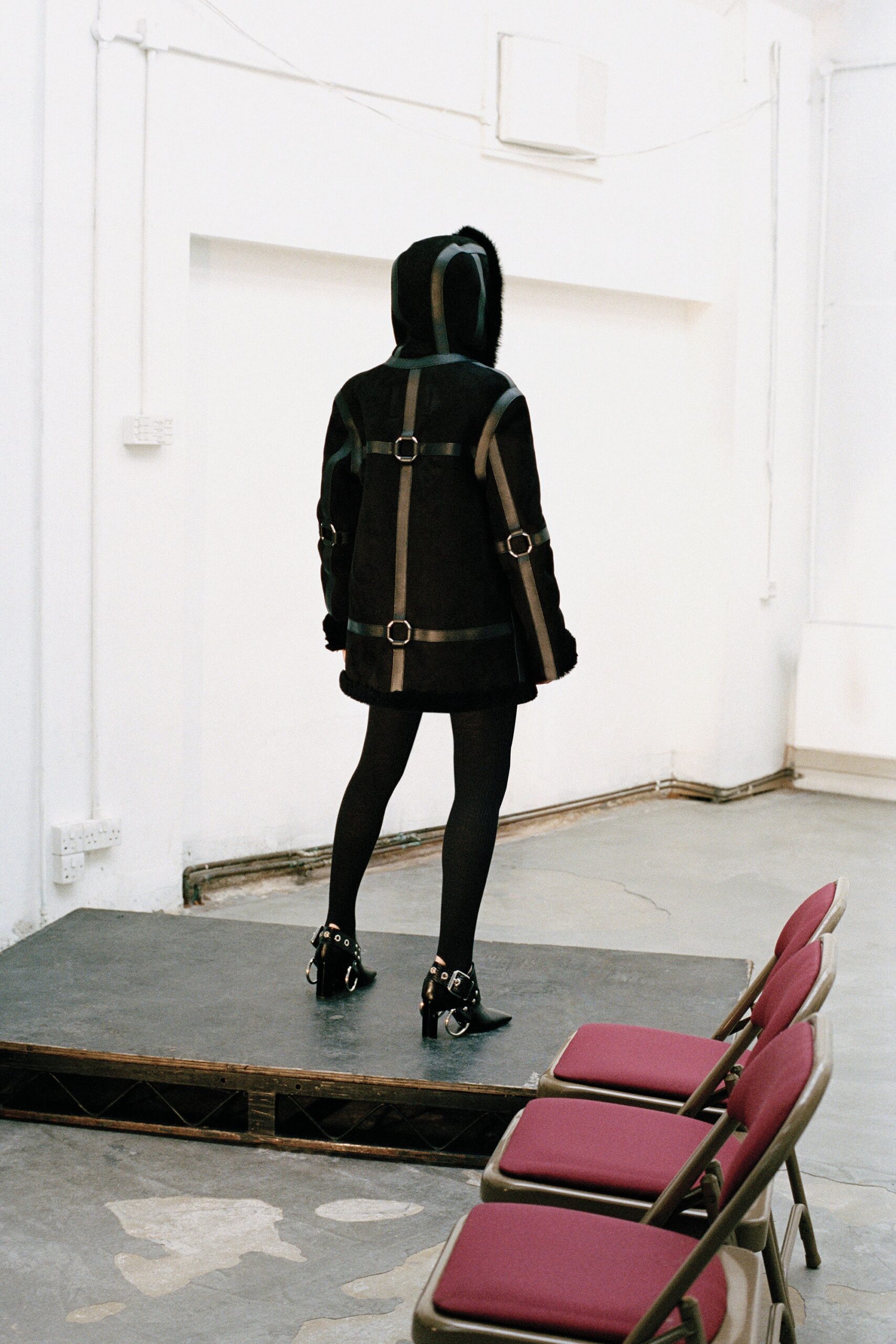 black leather fitted spiked boots