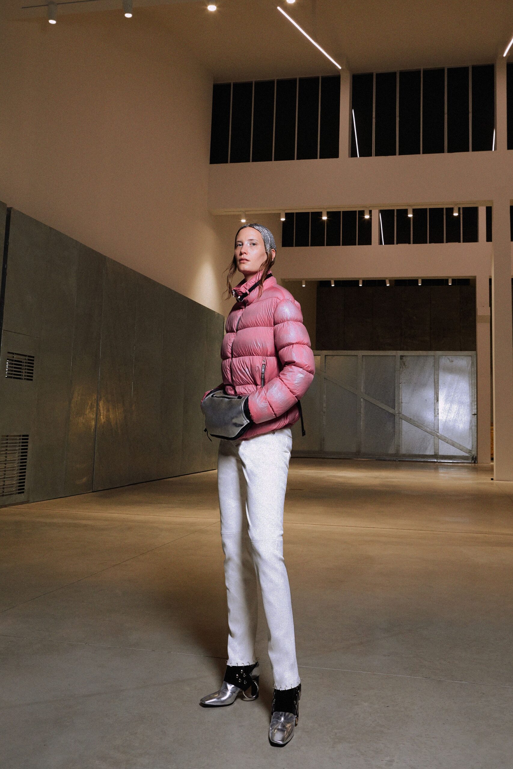 pink padded jacket with white pants