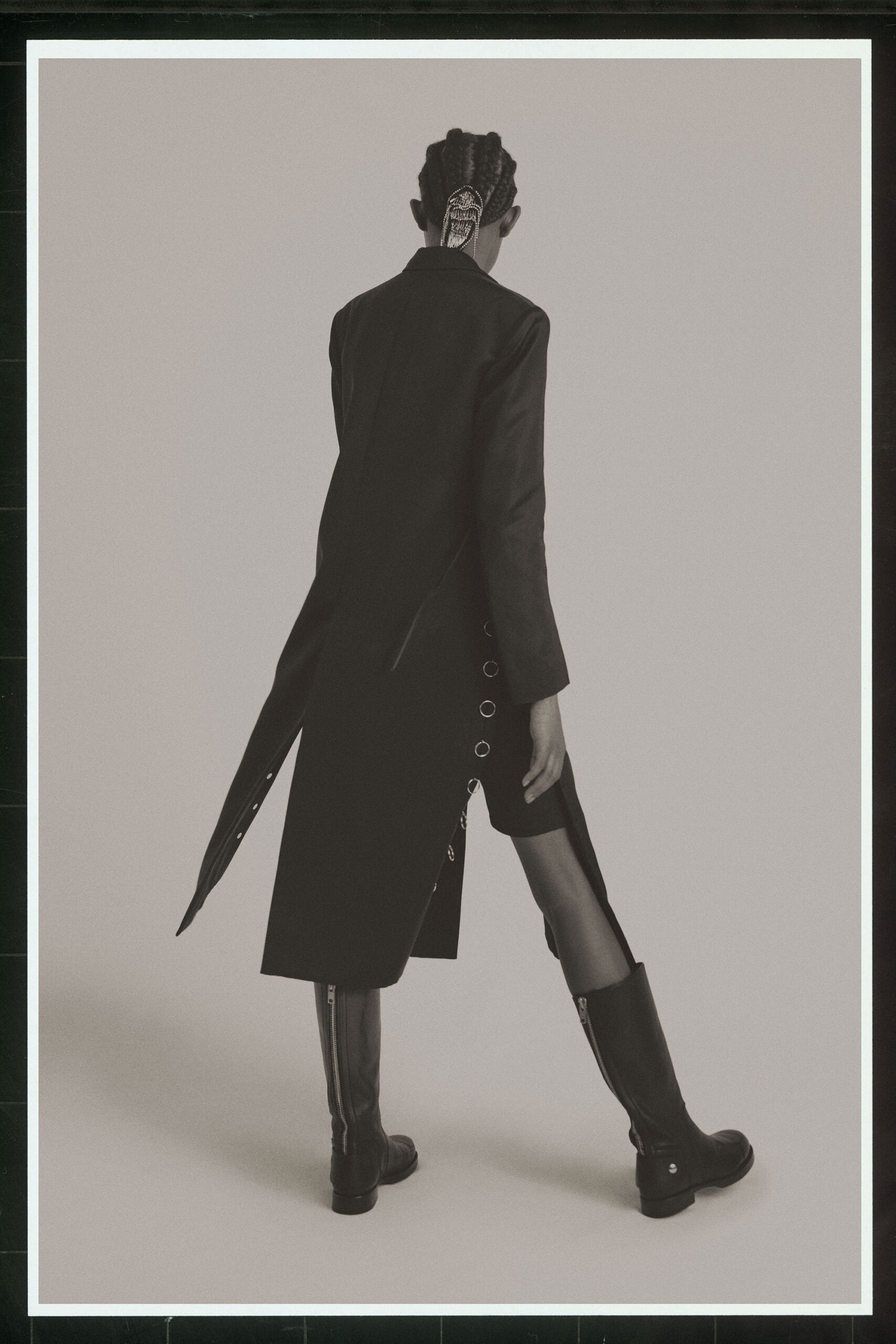 black fitted coat and boots