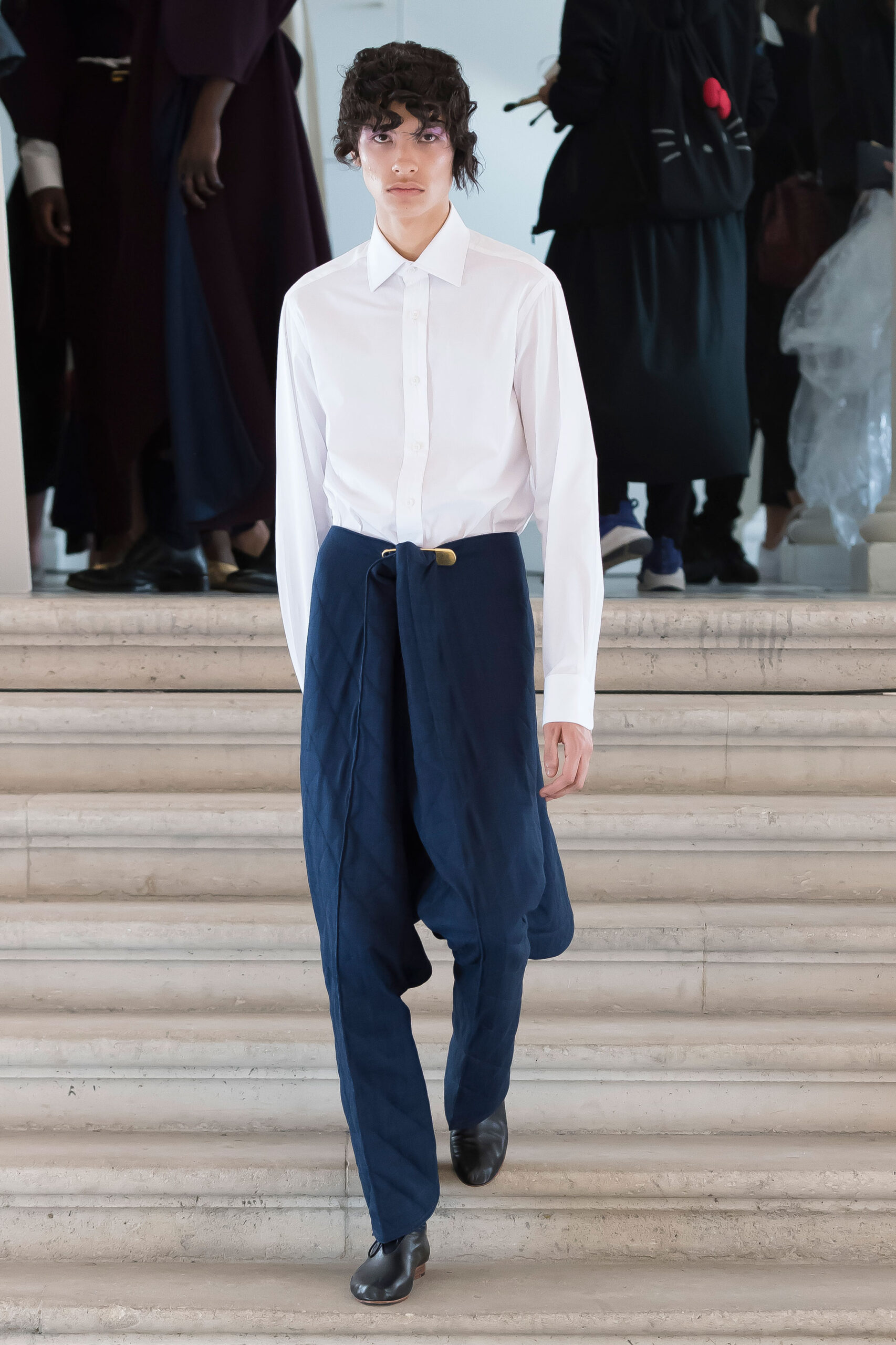 white fitted shirt with blue pants