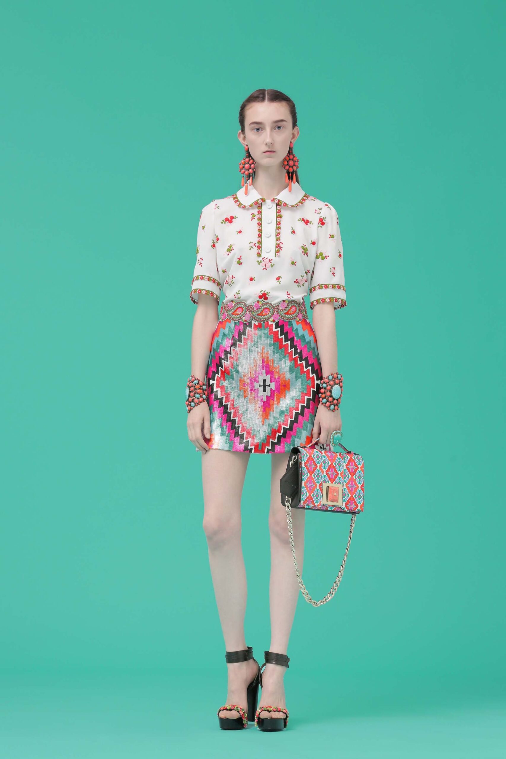 embroidered white shirt and mini skirt
