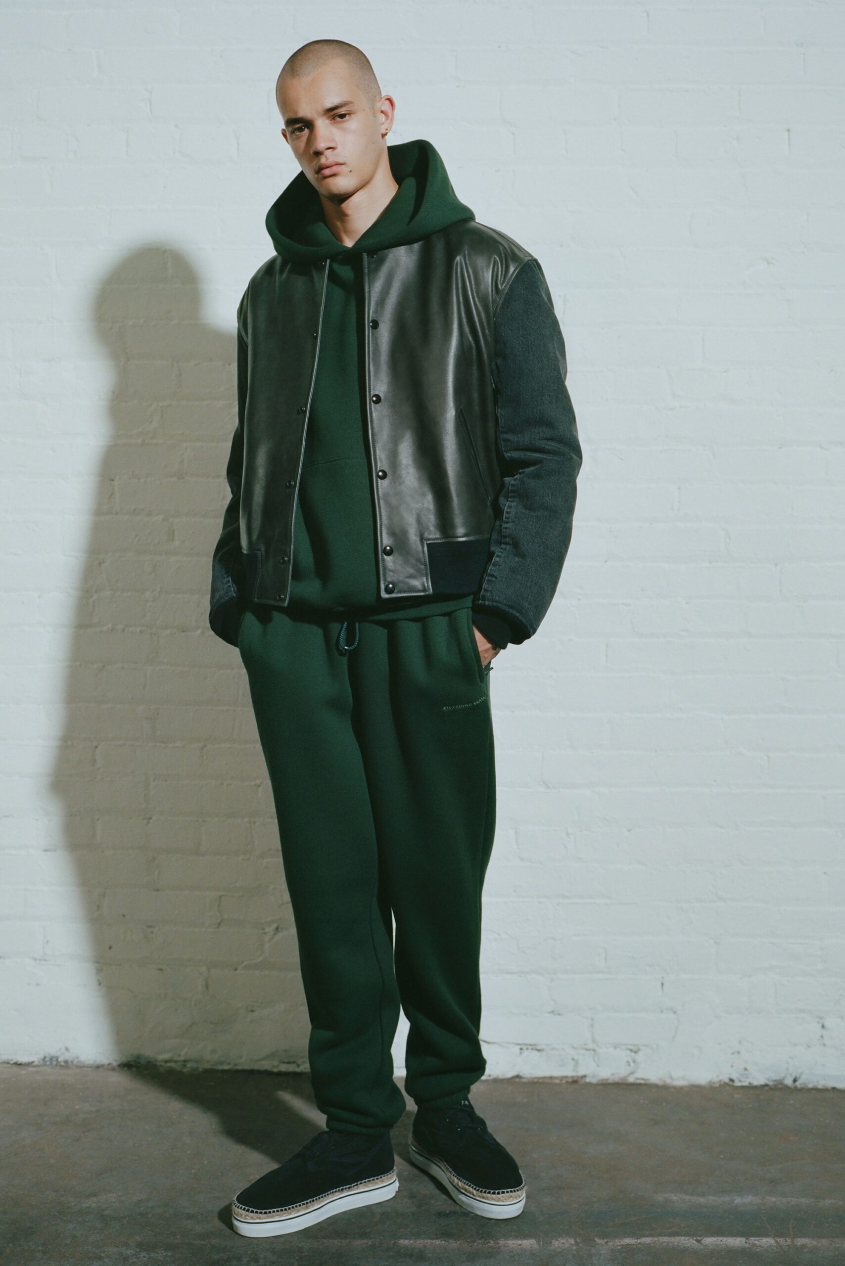 black gray jacket green hoodie pants