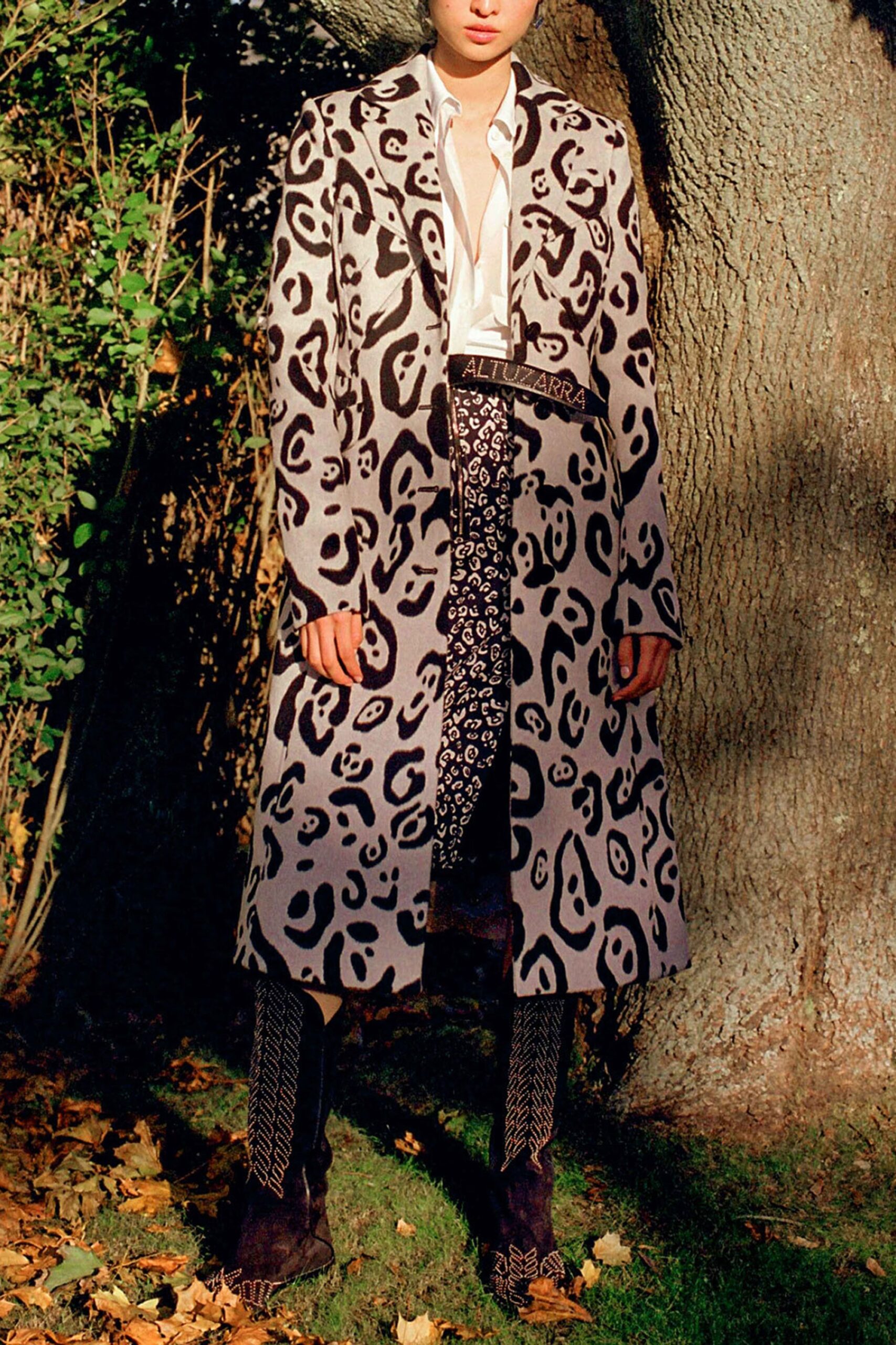 animal-print coat with flared skirt