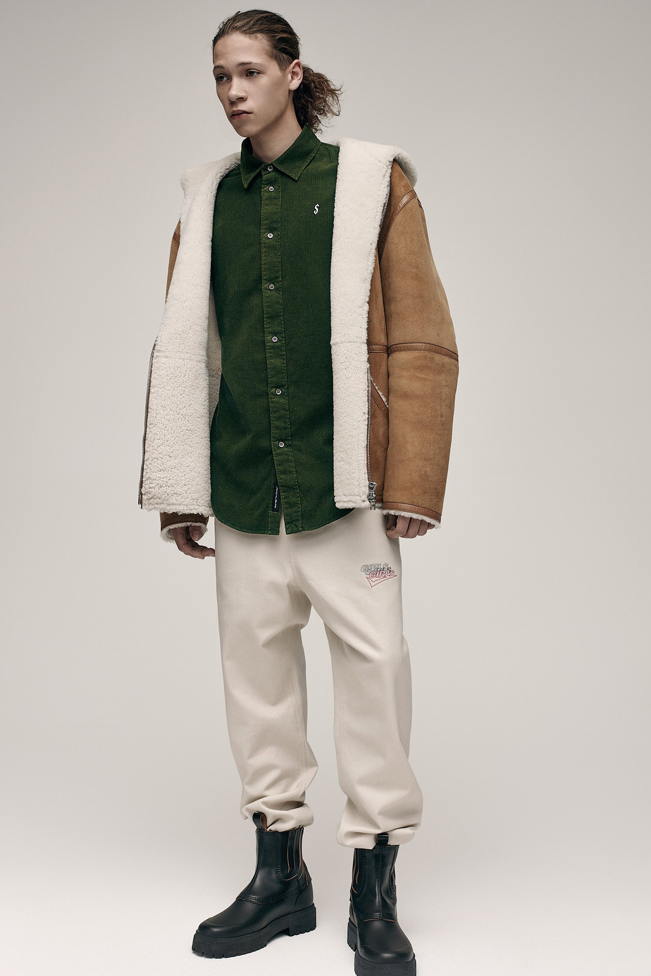 brown leather jacket with green shirt