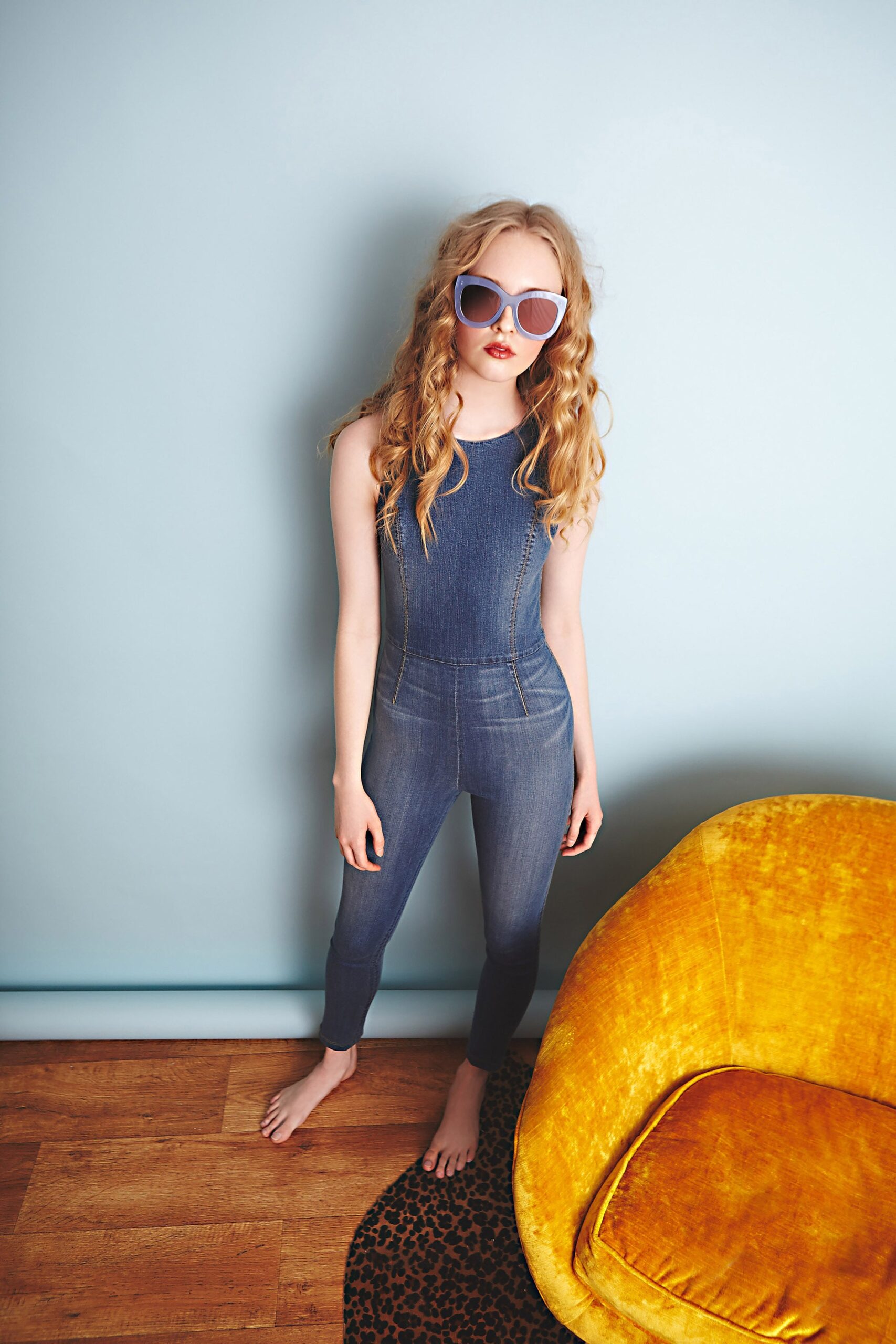 blue denim sleeveless high-neck fitted zippered catsuit