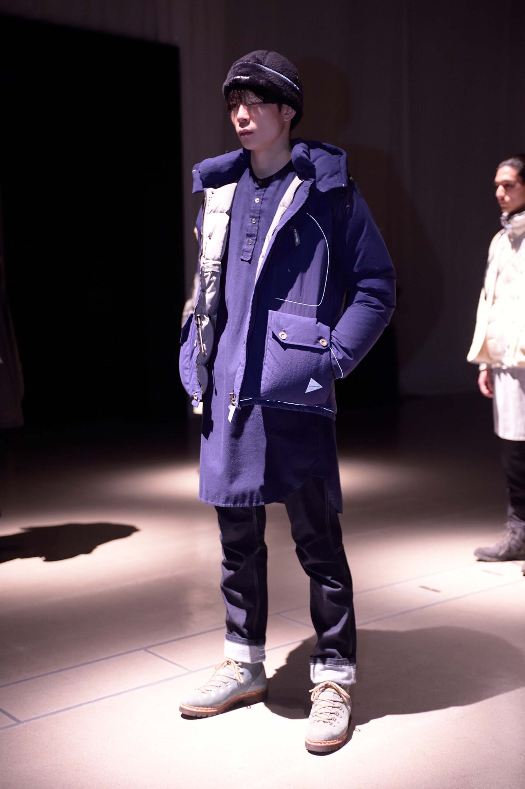 blue relaxed coat with black pants