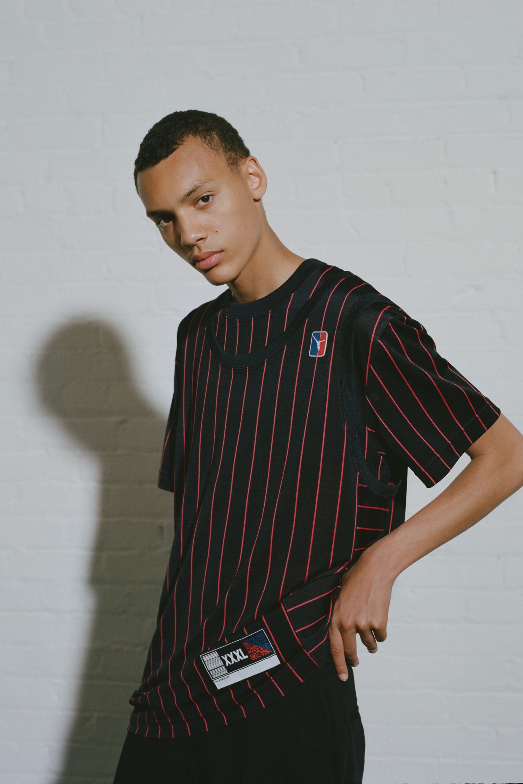 black short-sleeve collared relaxed striped t-shirt