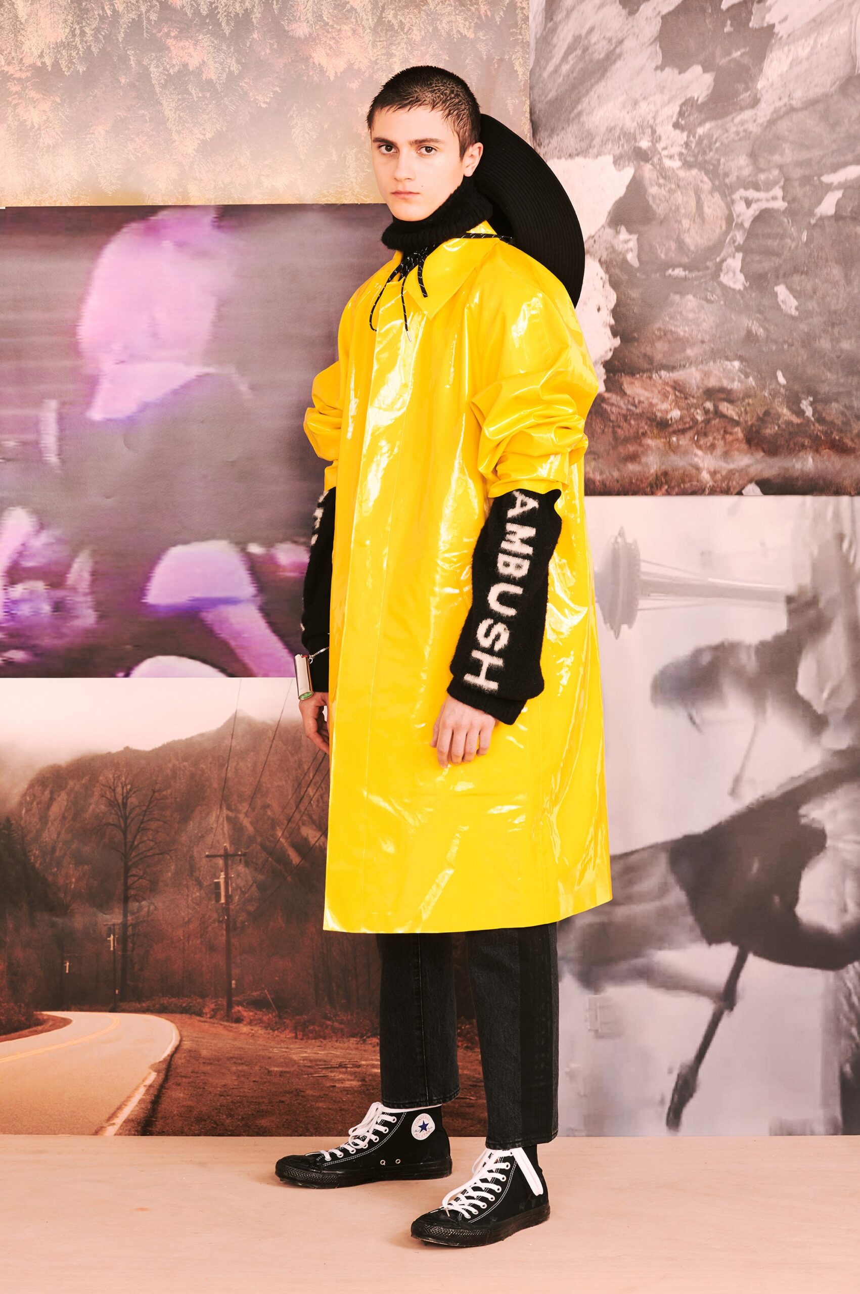 yellow vinyl coat with black pants