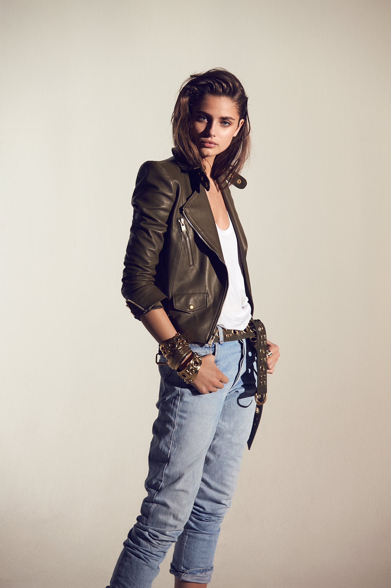 green leather fitted jacket with jeans