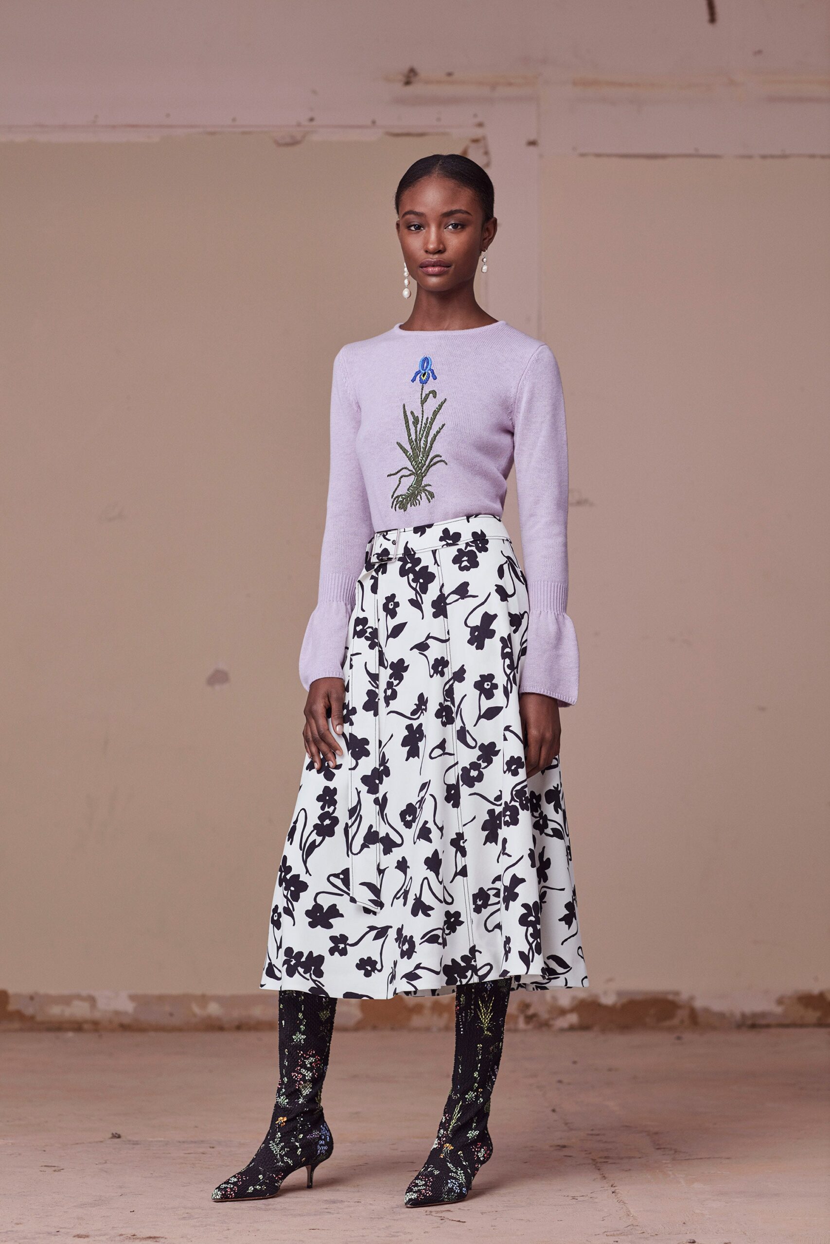 purple wool sweater and floral skirt