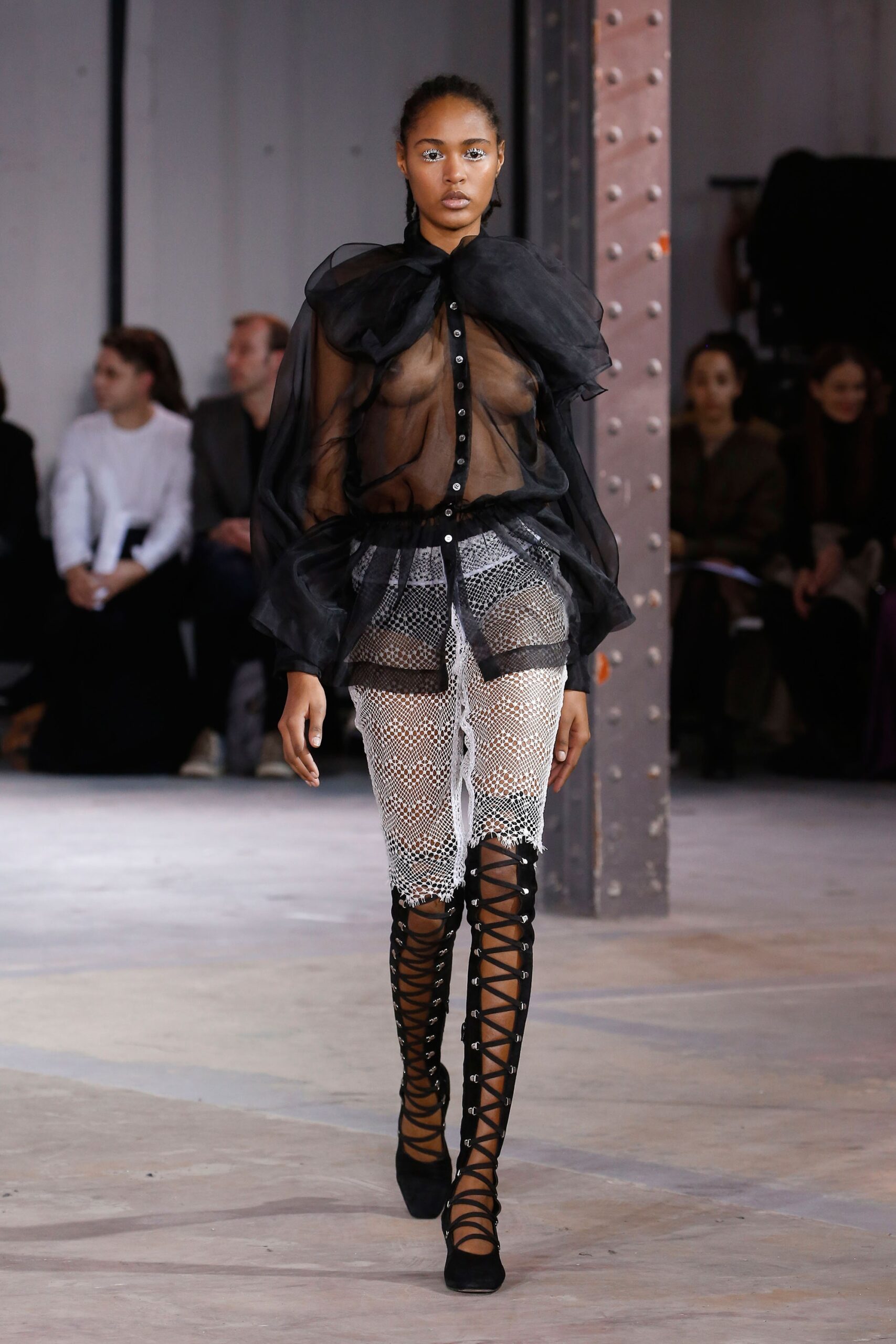 black sheer blouse with mesh pants