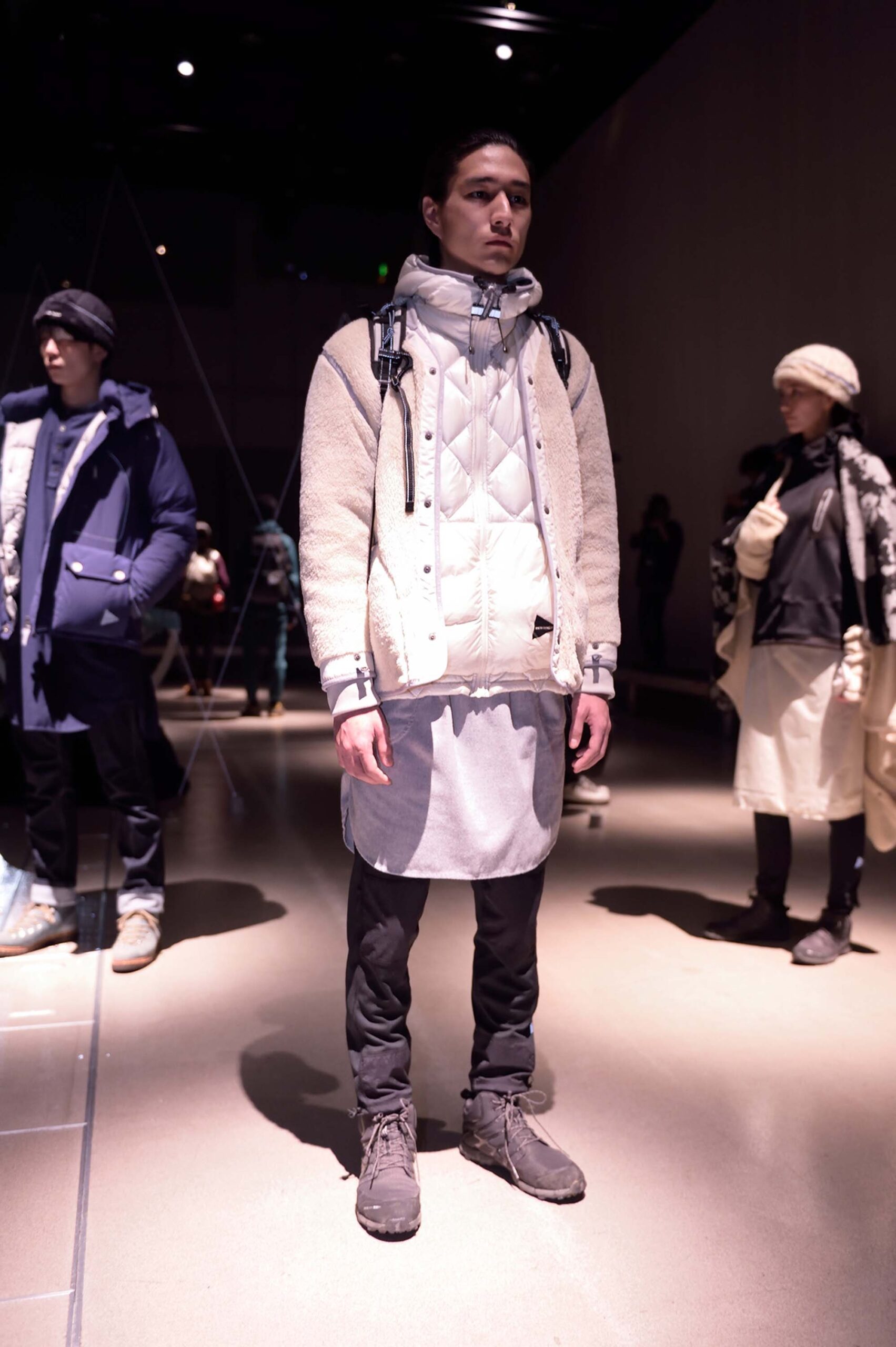 beige wool jacket with white vest
