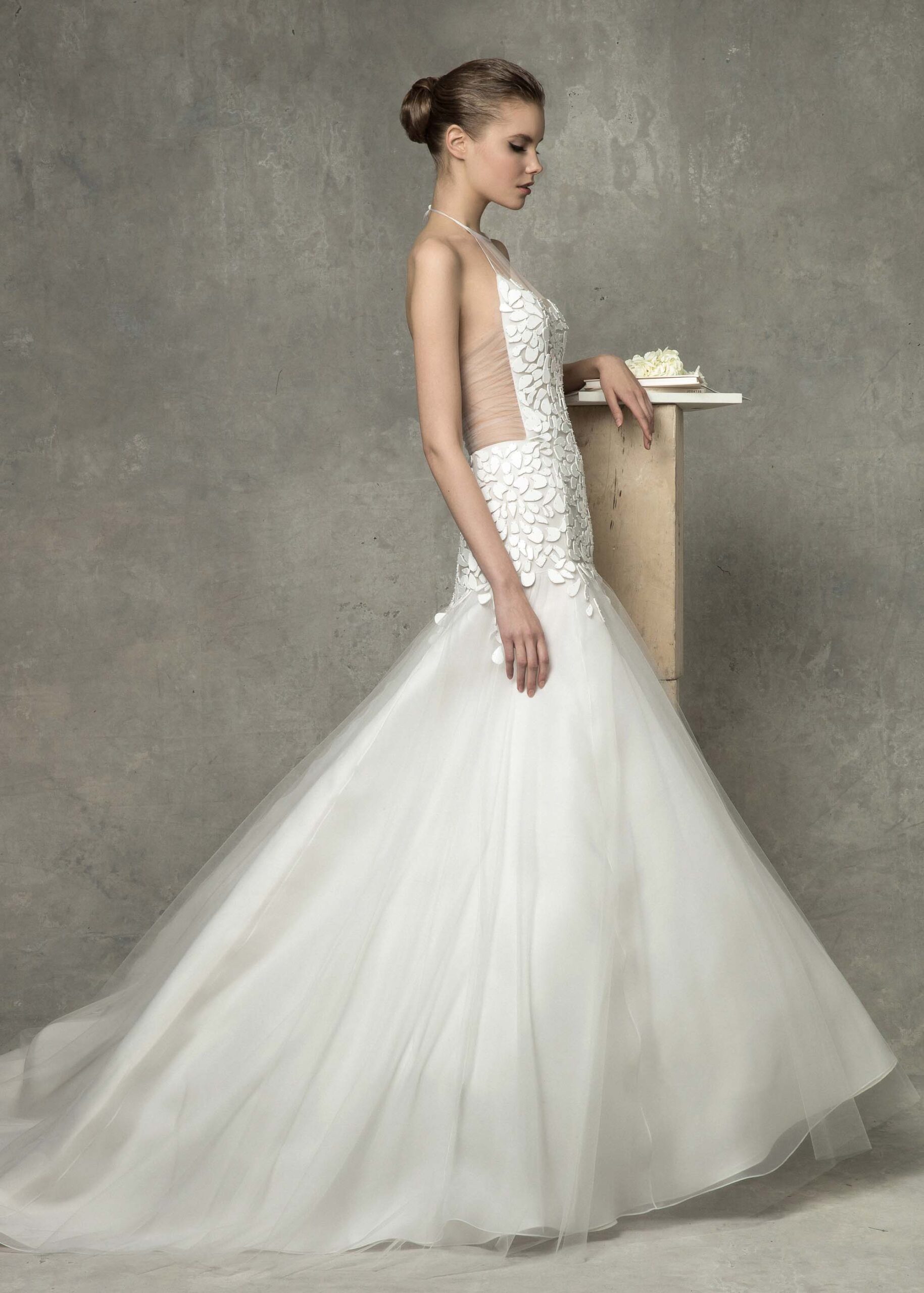 white ruffled sleeveless gown