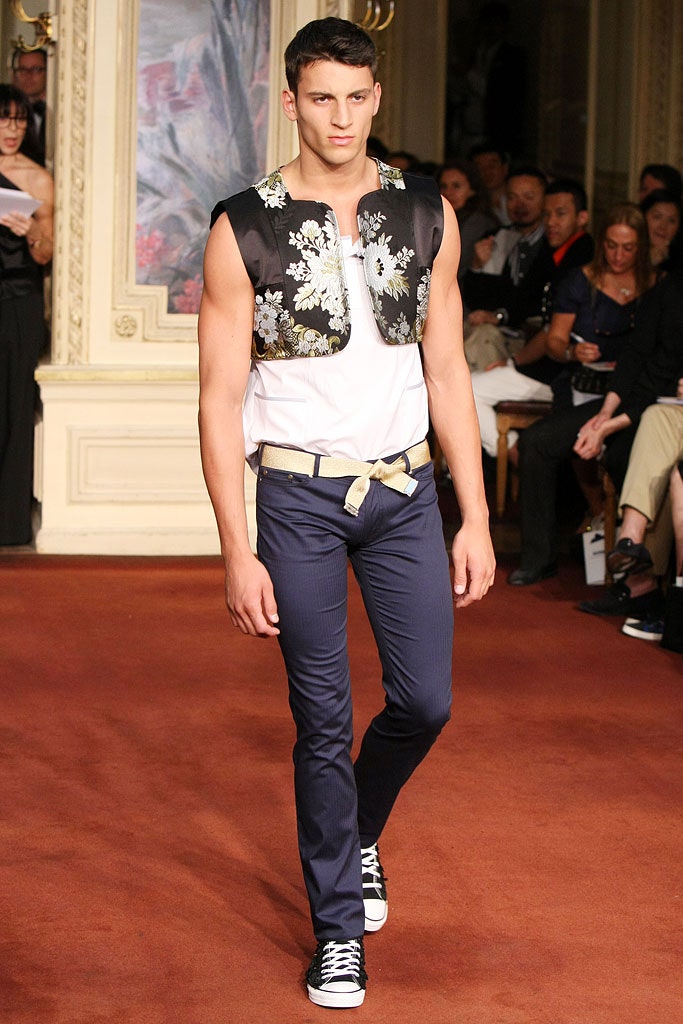 white fitted top with embroidered jacket