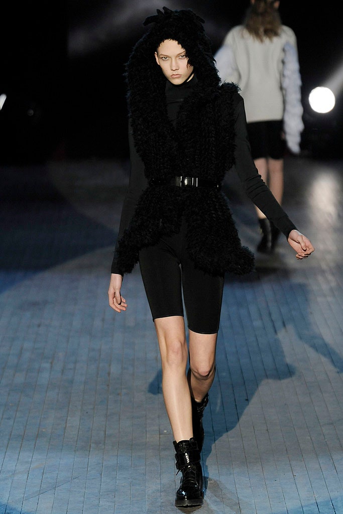 black faux-fur vest with bodysuit