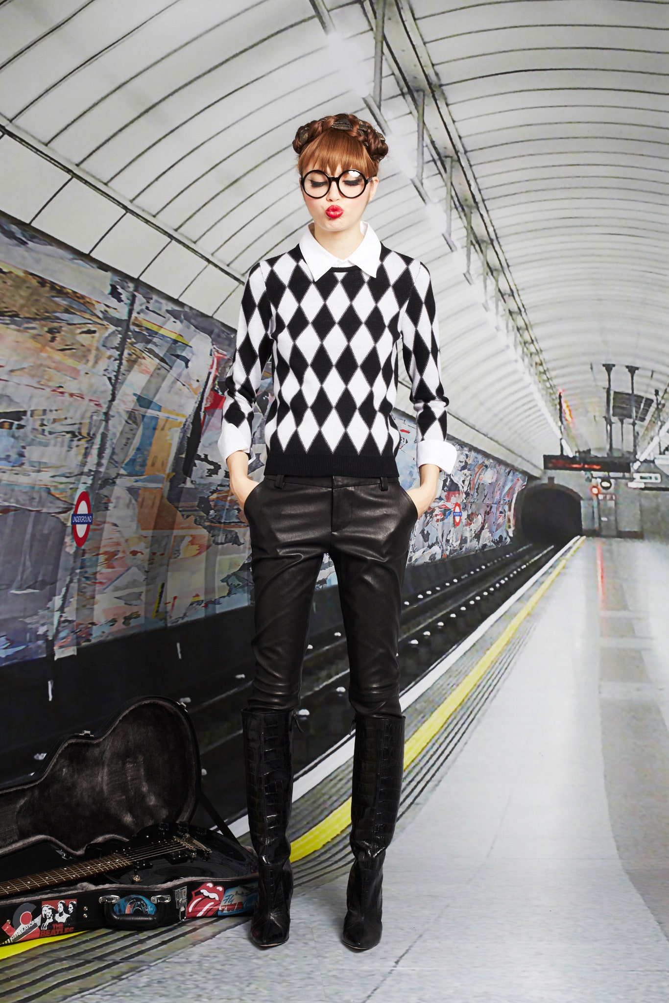 black and white checked sweater with leather pants