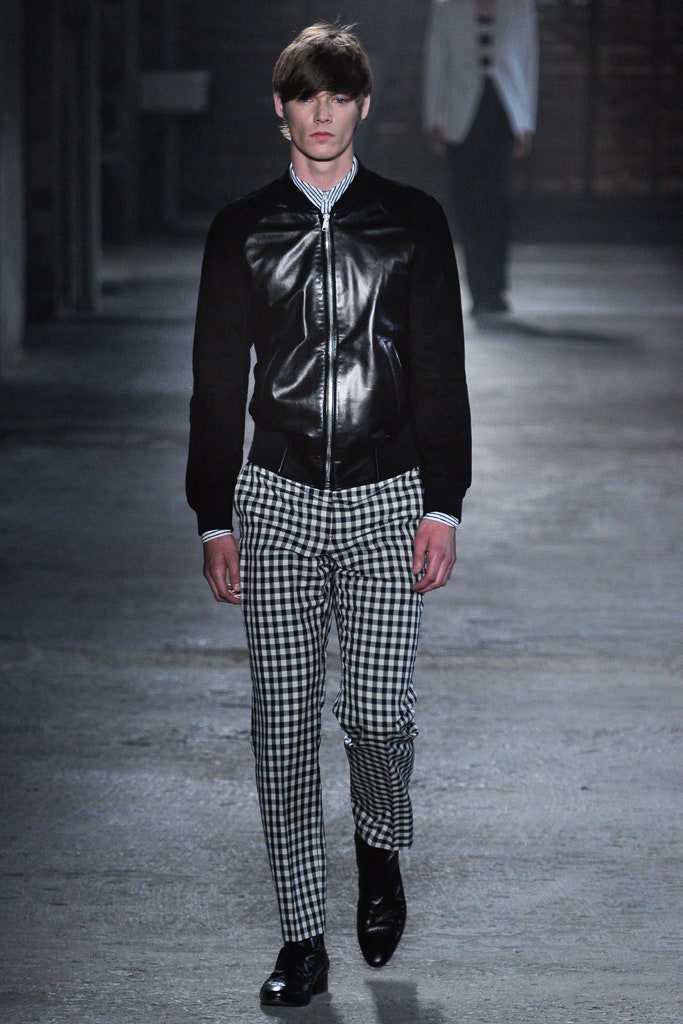 black leather fitted jacket with checked pants