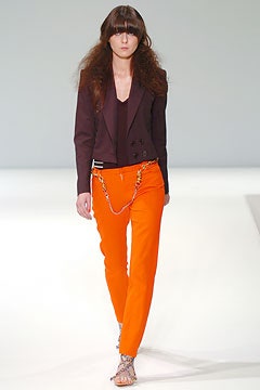 purple tailored blazer and orange pants