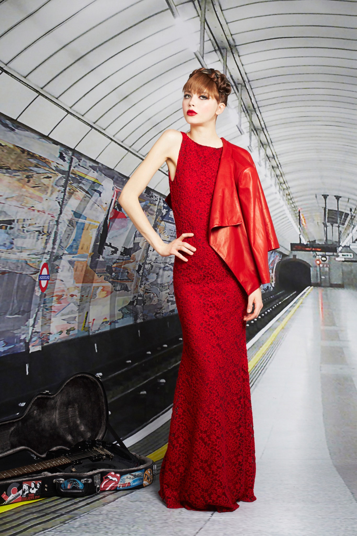 red embroidered gown with leather jacket