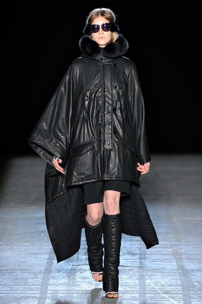 black leather poncho and boots