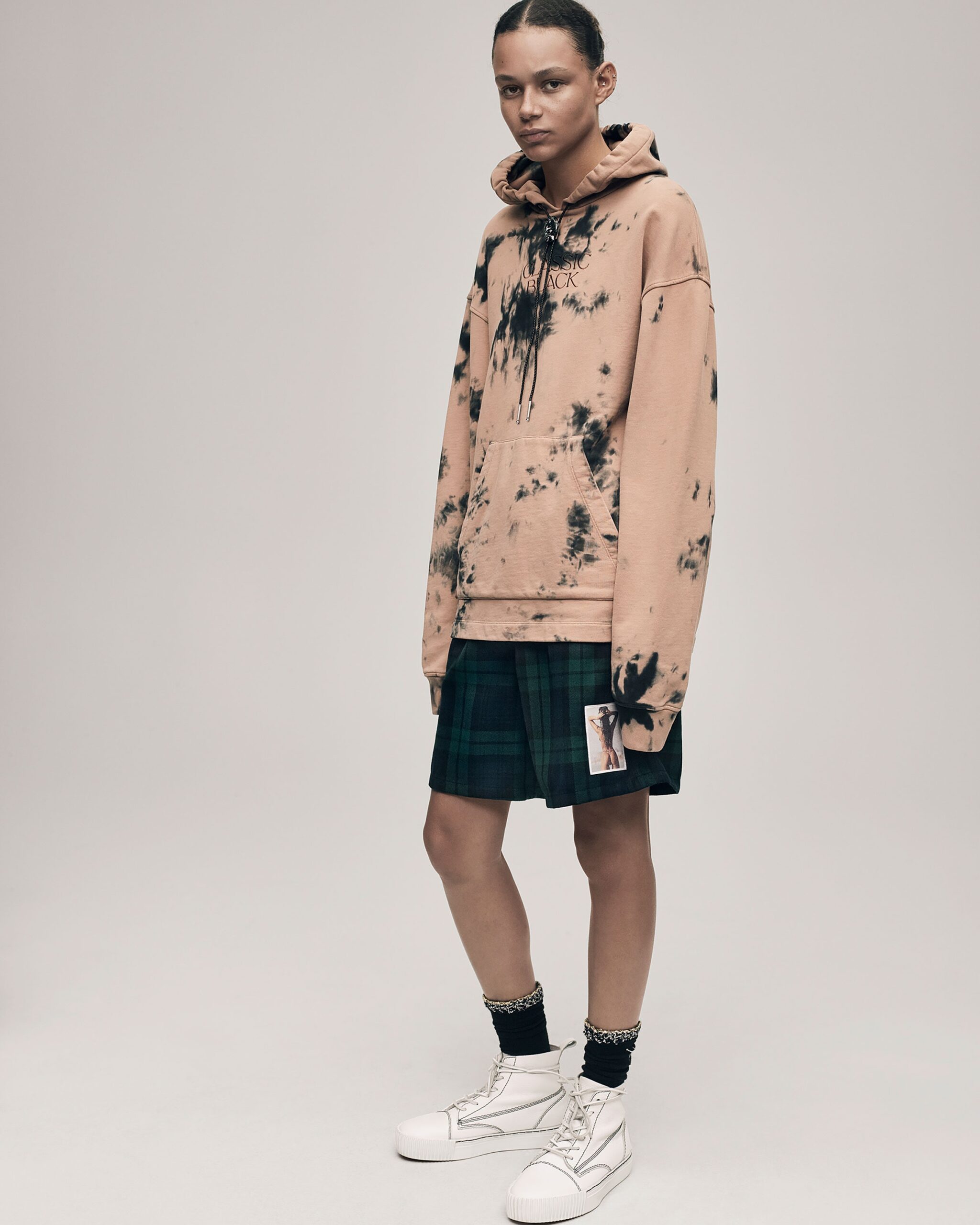 oversized pink hoodie with plaid shorts