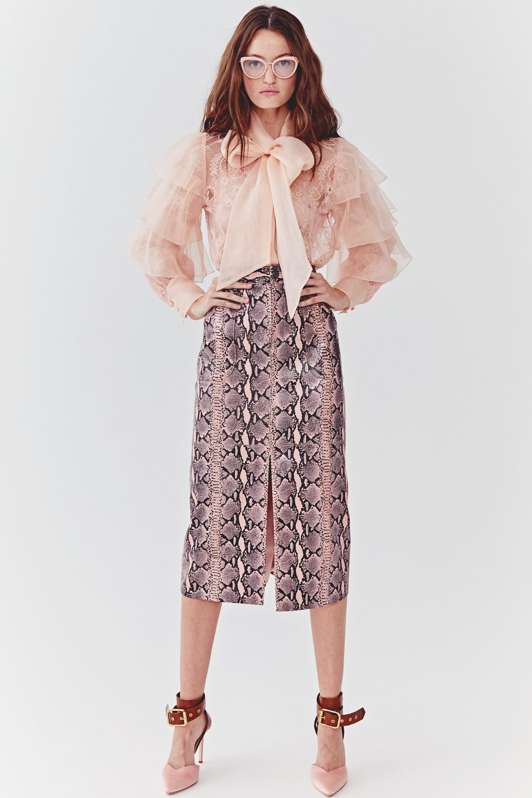 pink ruffled blouse and multi skirt