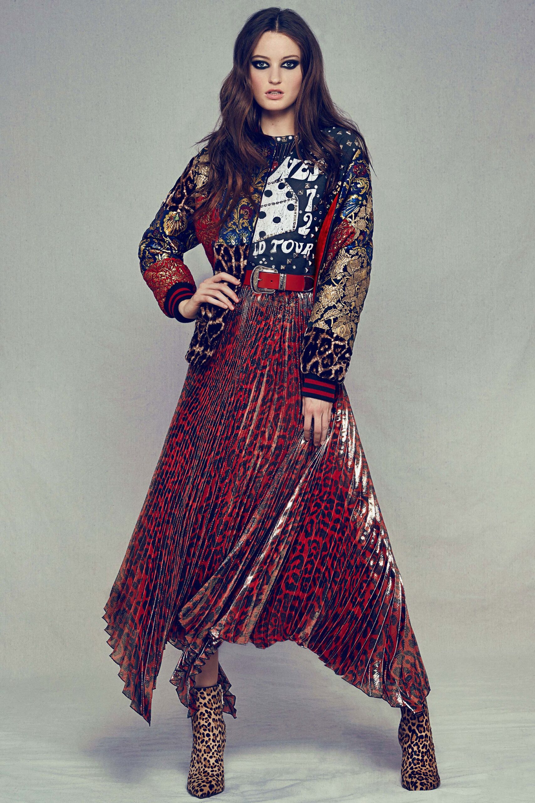 multi-colored embroidered jacket with pleated skirt