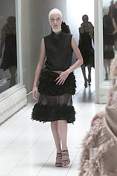 black silk top and ruffled skirt