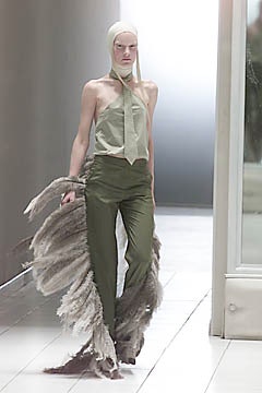 green fitted top and pants