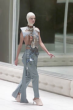 multi-layered top with tailored pants