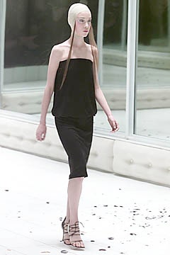 black strapless midi dress with strappy shoes