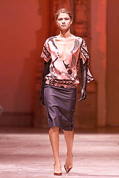 pink silk top with black pencil skirt