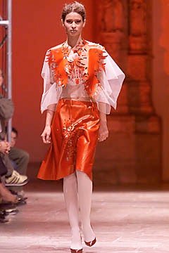 orange silk midi skirt and blouse