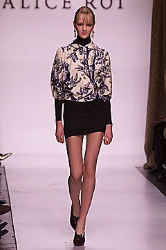 black mini dress with embroidered jacket