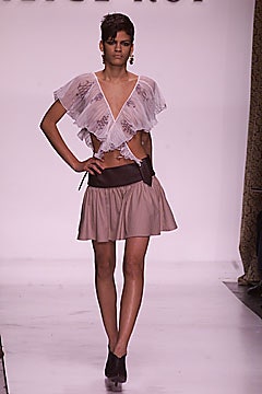 white ruffled top and beige skirt