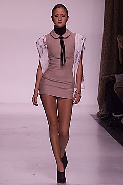 beige fitted mini dress with white cape