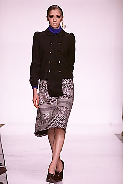 black fitted blazer and midi skirt