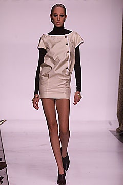 beige mini dress with black turtleneck
