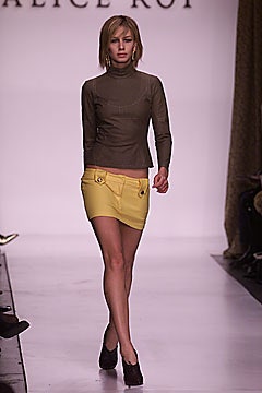 brown fitted turtleneck top with yellow skirt