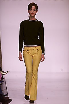 green fitted top with yellow flared pants