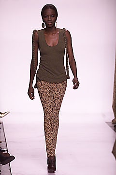 green fitted top with printed pants