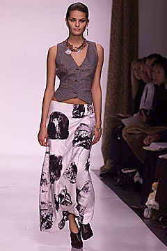 gray fitted vest and printed maxi skirt