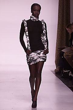 fitted black top and mini skirt