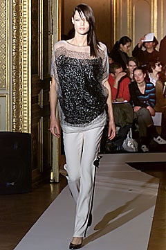 black sequined top with tailored pants